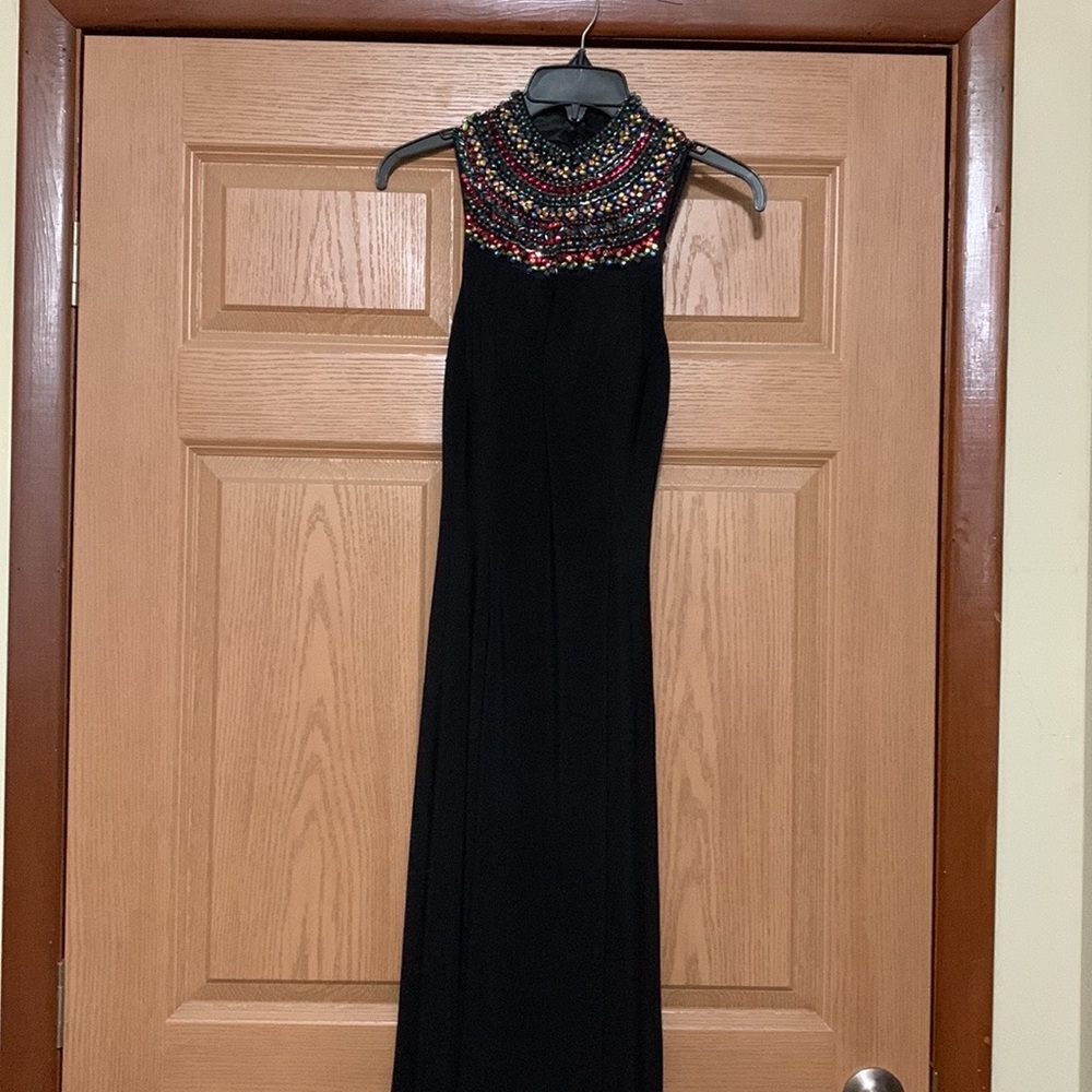 Sherri Hill Size 4 Formal Dress. Black with multi color sequins